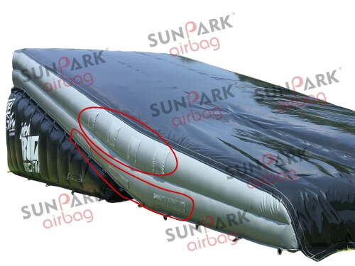 Close up of adjustable air vents on the side of a SunparkAirbag inflatable landing airbag for customized firmness